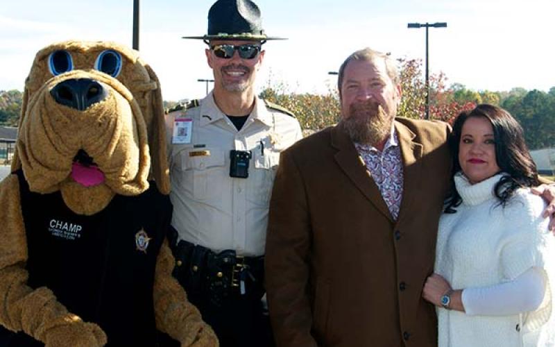 Many patriots attended the Veterans Day Ceremony at the Fannin County Veterans Memorial Park Saturday, November 6. Among a sea of people are, from left, CHAMPS mascot James Burrell, School Resource Officer Darvin Couch, Blue Ridge councilman-elect Jack Taylor and Tonya Nuelle.