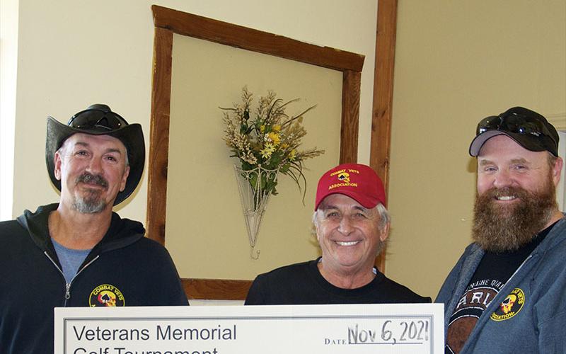 Combat Veterans Motorcycle Association Chapter 25-3 members, from left, Commander Rob “Bandit” Denison, Bob “Renegade” Renneke and Treasurer Dennis “Dyno” Teems hold up a check of their earnings from their Veterans Memorial Golf Tournament. Tournament Director Mike Panter and Treasurer Ken Brenneman are not pictured.