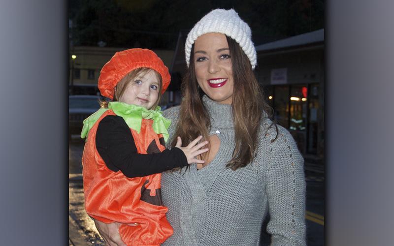 Little pumpkin Mary-Jean Callihan with mom Amber Dickey was excited to dress up and score some candy during the Halloween Safe Zone in McCaysville and Copperhill Friday, October 29.