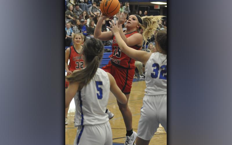 Destiny Pittman goes up for a two-point floater in recent action for the Copper basin Lady Cougar basketball team.