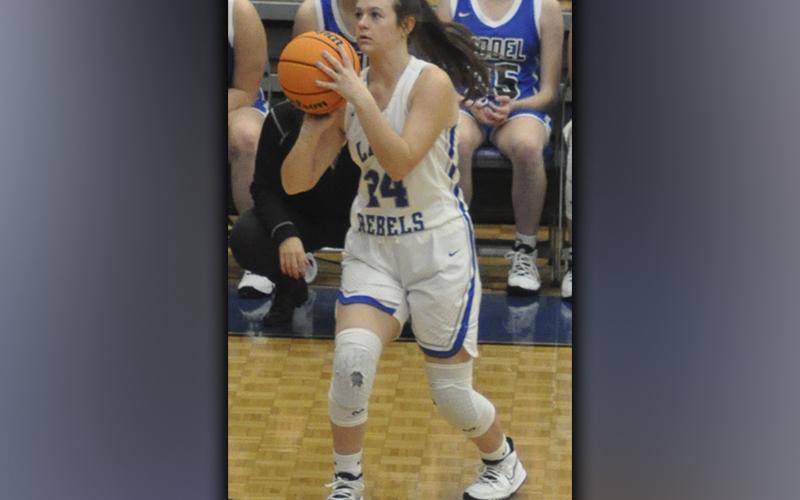 Jayden Bailey lines up a three point basket in recent action for the Fannin County Lady Rebel basketball team.