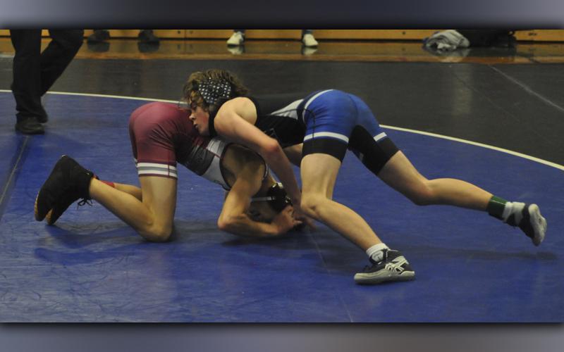 Landon Poole battles to pin his opponent in recent action for the Fannin County High School wrestling team.
