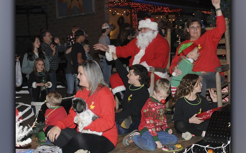 Santa and a few of his helpers arrived to the delight of children gathered in Ducktown for the annual parade Saturday night.