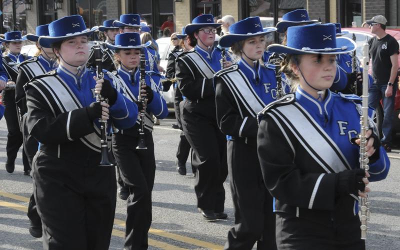 The Fannin County High School Marching Band parades through the twin cities.