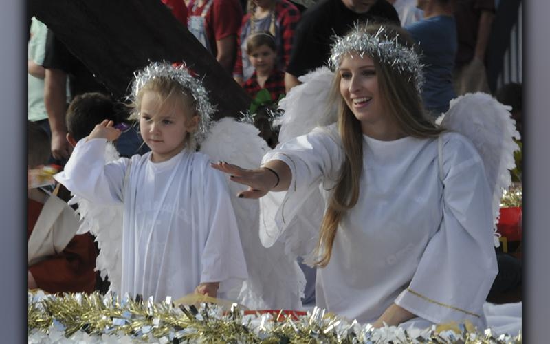 These angels wave to the crowd during the Copperhill Kiwanis Club’s annual Christmas Parade through the twin cities of Copperhill and McCaysville.