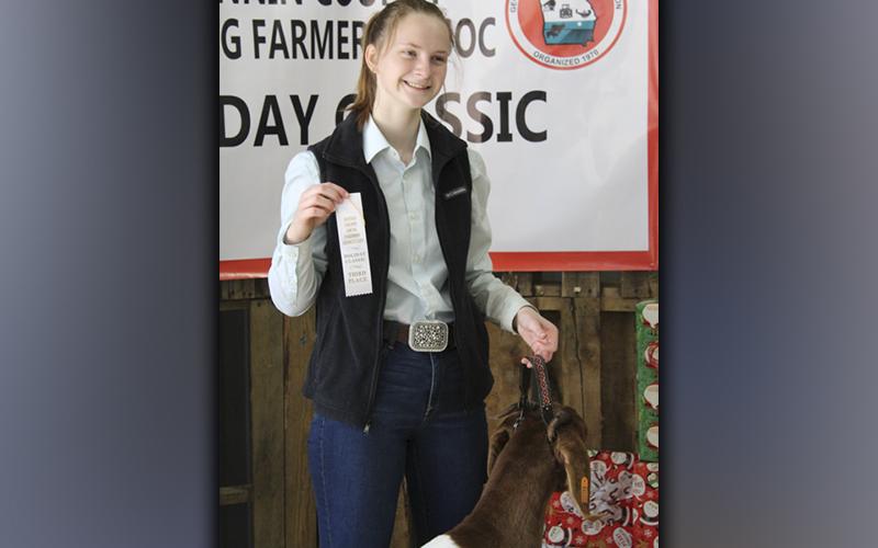 Abby McFarland showed her new goat, Barbie, in the Fannin County Young Farmers Association Breeding Ewe and Doe Holiday Classic, Saturday, December 4, where they won a third place ribbon in their weight class.