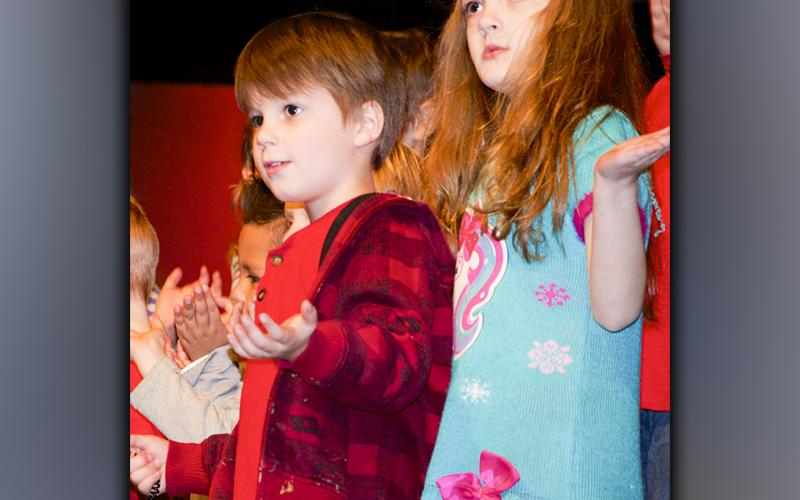 Alvin Barnes and Lillian York help spread some Christmas cheer during West Fannin Elementary School’s White Christmas performance at the high school’s Performing Arts Center Thursday, December 16.