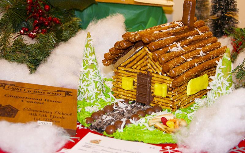 Elementary school student Deacon Billups took first place with his “Deacon’s Dream Cabin” submission in the elementary grades fourth through fifth category of the Light Up Blue Ridge annual Gingerbread House Contest.