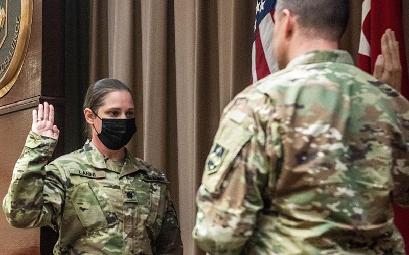 Abby Lanni re-affirms the Oath of Commissioned Officers with Colonel Richard Ball, Maneuver Support Center of Excellence Chief of Staff, during her lieutenant colonel promotion ceremony at Fort Leonard Wood, Missouri, November 23.