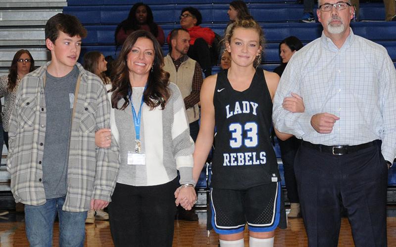 Reagan York, who has played for the Lady Rebels varsity for four years, was honored during Senior Night Friday, January 7, at the Fannin County High School gym. She is shown with her parents, Shannon and Richard York, and her brother, Hudson.