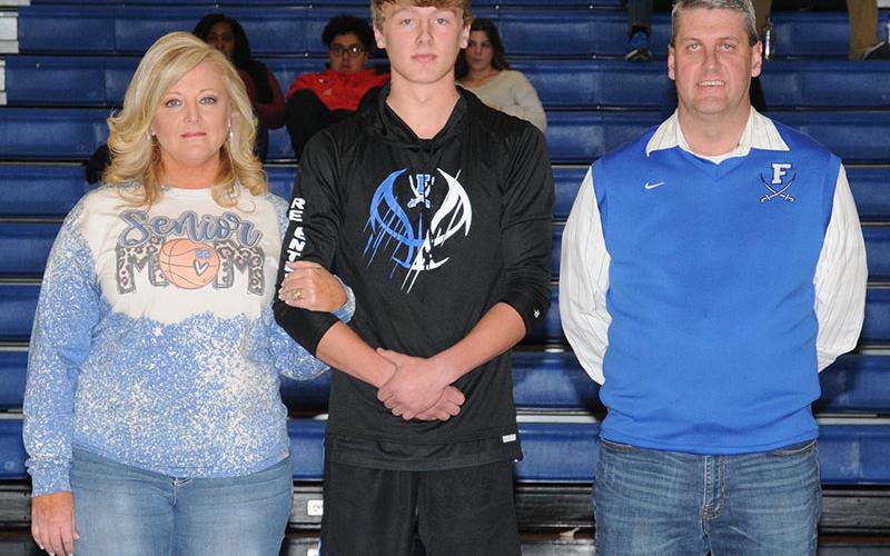 Landon Norton has played for the Fannin County Rebels for four years, three of those on the varsity basketball team. He was honored during Senior Night, Friday, January 7, at the Fannin High gym. Escorting him are his parents, Holly and Ryan Norton.