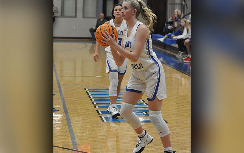 Lady Rebel Ava Queen eyes a three-point basket in recent action for the Fannin County Lady Rebel basketball team.