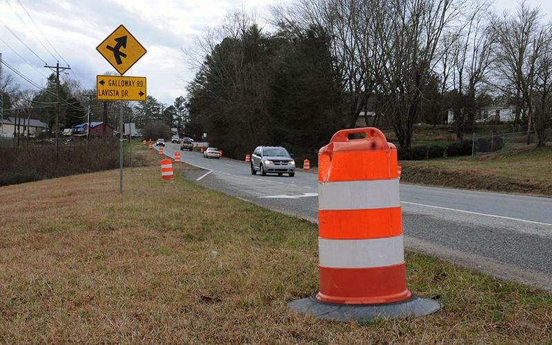 Large orange barrels line Highway 5 south of McCaysville as contractors being preparations for widening the highway.