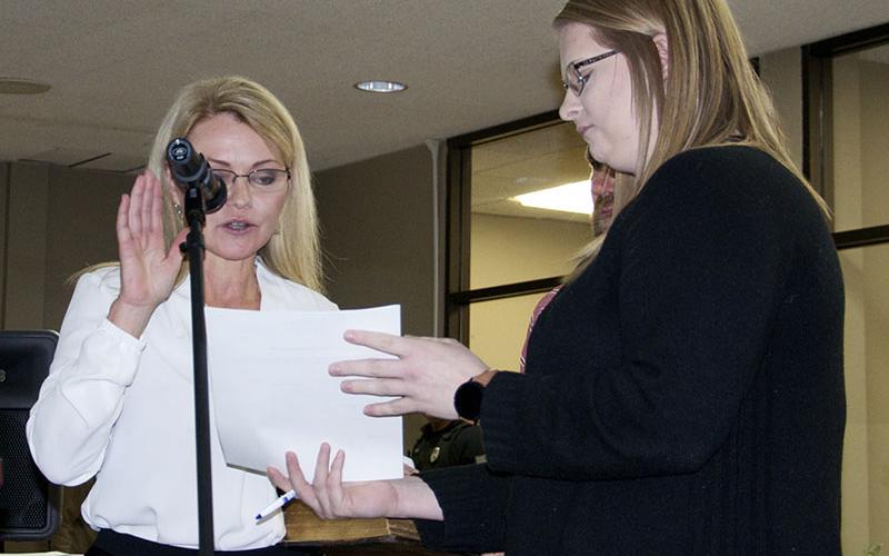 With tears in her eyes, Blue Ridge Mayor Rhonda Haight, left, is shown taking her Oath of Office during the administration’s first council meeting Tuesday, January 18. She is shown alongside City Clerk Amy Mintz.