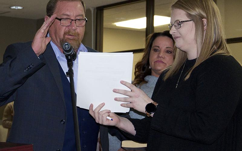 During the first official meeting of the new Blue Ridge council, the new members were sworn in. Giving his Oath of Office is Councilman Jack Taylor with Tonya Nuelle, middle, holding the bible and City Clerk Amy Mintz.