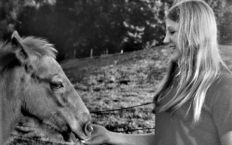 Patty Callihan and her horse on the family farm.