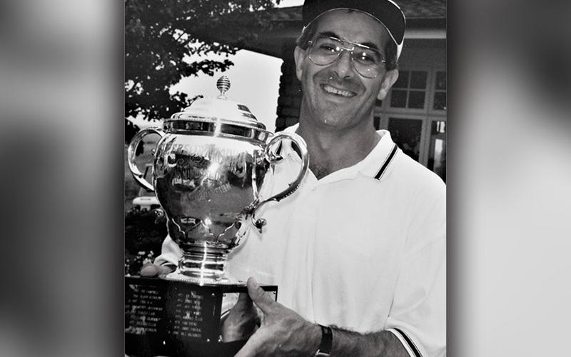 Chuck Jabaley proudly displays his trophy as the 1994 Tennessee Open champ.