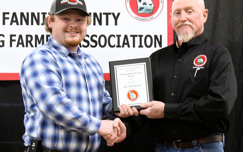 Ace Hardware of Blue Ridge was awarded Distinguished Service Award 2021 at the Fannin County Young Farmers Association (FCYFA) Awards Banquet Friday, February 4. Shown are, from left, Samuel Parks accepting on behalf of Ace and FCYFA President Kenny Queen.