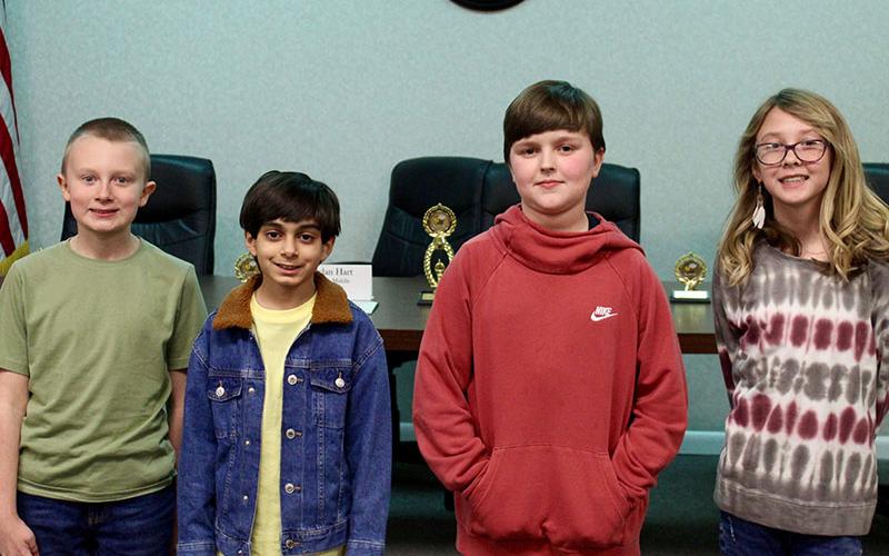 Winners from each Fannin County schools’ Spelling Bee, excluding the high school, competed at the Fannin County School System’s Spelling Bee Tuesday, January 25, at the Fannin County Board of Education office. Shown are, from left, Dylan Hart representing Fannin County Middle School, Hashim Usman representing Blue Ridge Elementary School, Owen Thomas representing West Fannin Elementary School and Danica Nicholson representing East Fannin Elementary School.