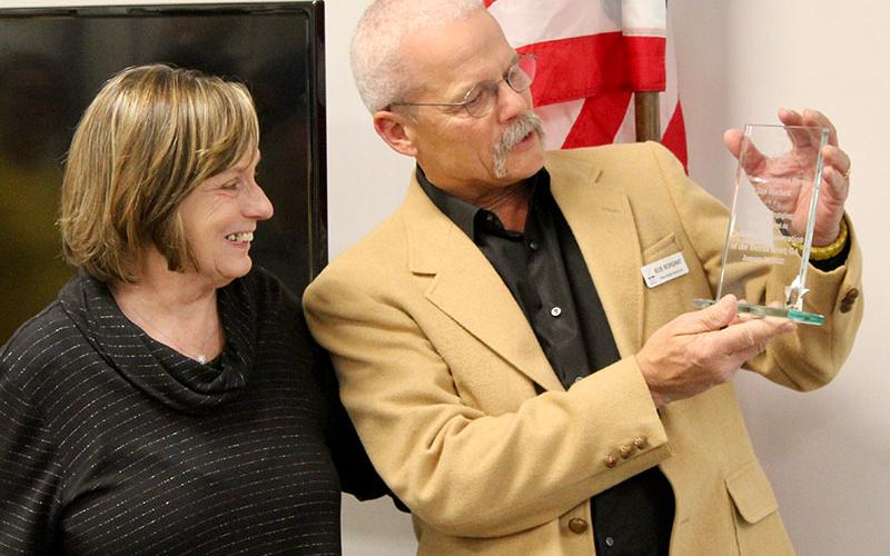 Long-time president of the Fannin County Chamber of Commerce Jan Hackett was awarded “Our Conservation Hero” by the local Blue Ridge Mountain Trout Unlimited (BRMTU) chapter for her commitment to the cold-water conservation of the Toccoa River and her years of support. The award was presented at the Back the Brookies Winter Bash Saturday, January 29. She is shown with BRMTU member and event coordinator Bob Borgwart.