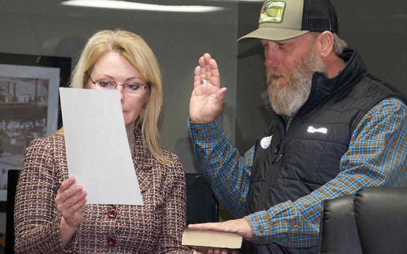 Andy Bowen is shown taking his Oath of Office with Blue Ridge Mayor Rhonda Haight Monday, Feburary 7, after Bowen was appointed to the downtown development authority by the city council.