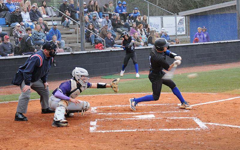 Bryson Holloway makes contact for the Fannin County Rebels. Fannin defeated Murray County 9-4.