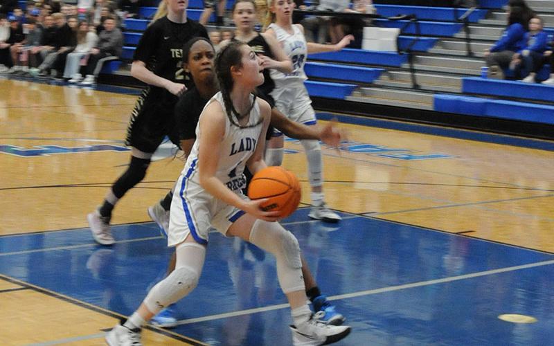 Courtney Davis drives the lane for Fannin County against Washington County. Davis challenged the inside defense of the visitors several times during the game.