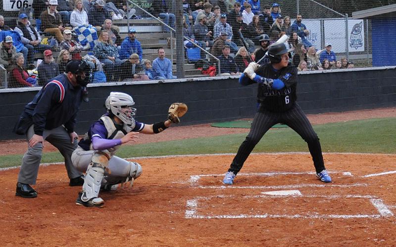 Carter Johnson focused on a pitch headed down the strike zone earlier this season.