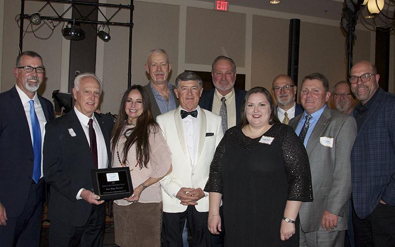 Outgoing Chamber Chairman Richard York, shown far left, presented the Kiwanis Club of Blue Ridge with the “Heart of the Community Award” Saturday, March 26 at the Fannin County Chamber of Commerce Banquet. Shown receiving the award, from left, are Kiwanis President Bill Echelberger, Pepperr McConnell, John Hood, Larry Ray, Mike Rustenberghe, Meagan Gourley, Erick Youngberg, Kevin Panter, Roger Teat and Troy Shirbroun.