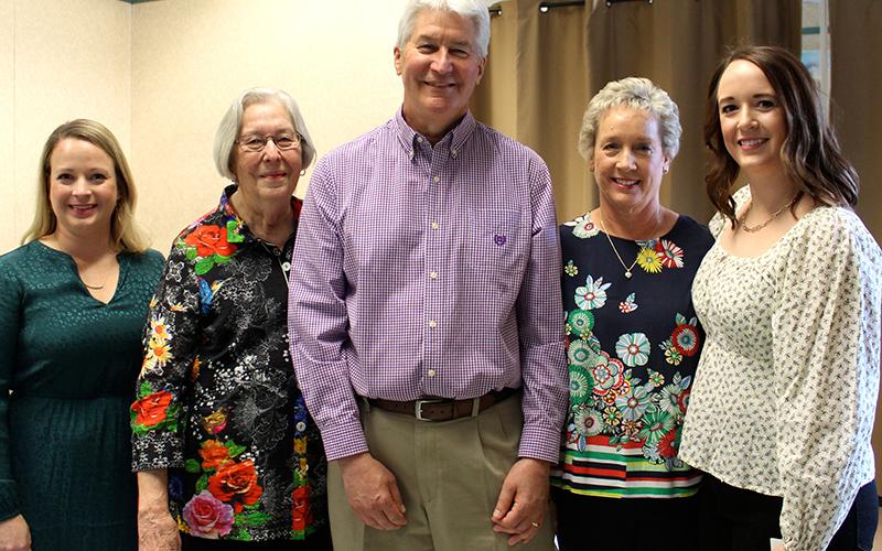 Copperhill native Dr. Garry Day, center, stands with his family Saturday afternoon, February 26, as the community celebrated his 40 years of dedication to the animals of Fannin County and surrounding areas. Shown are, from left, daughter, Emily Day Hodskins, mother, Marilyn Day, Dr. Day, wife, Linda Day, and daughter, Laura Day. “No matter how hard Garry worked or what kind of day he had, he always had time for his daughters when he came home at night,” Linda said.