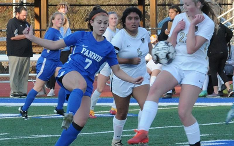 Taylor Poland works against Pepperell for the Fannin County Lady Rebels in their soccer match last Thursday. Fannin won the match 4-0.