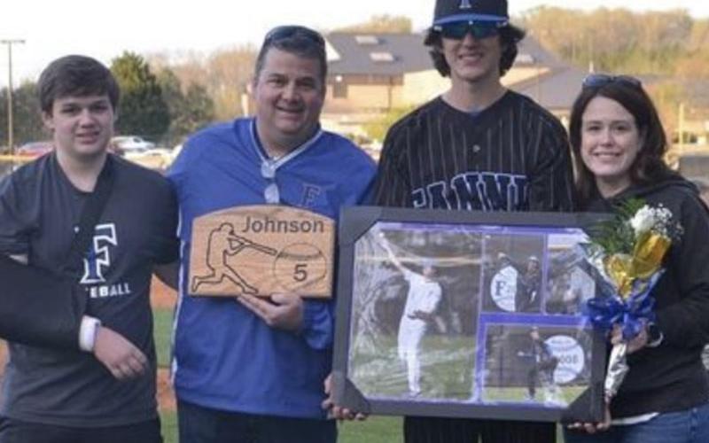 Senior Cater Johnson was escorted by his mother, Karyn Westcott, his father Brian Johnson, and his brother Conner Johnson.
