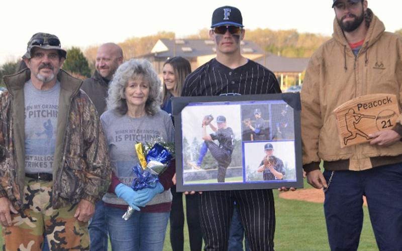 Senior Derrick Peacock was escorted by his parents, Richard and Janna Peacock, and his brother Devan Peacock.