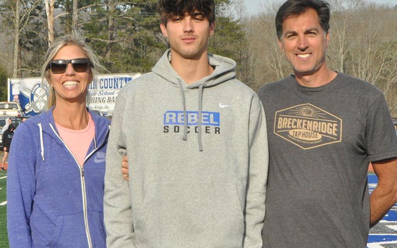 Senior Hayden Lynch, middle, was escorted by his mother Brandy Lynch and father Jeff Lynch.