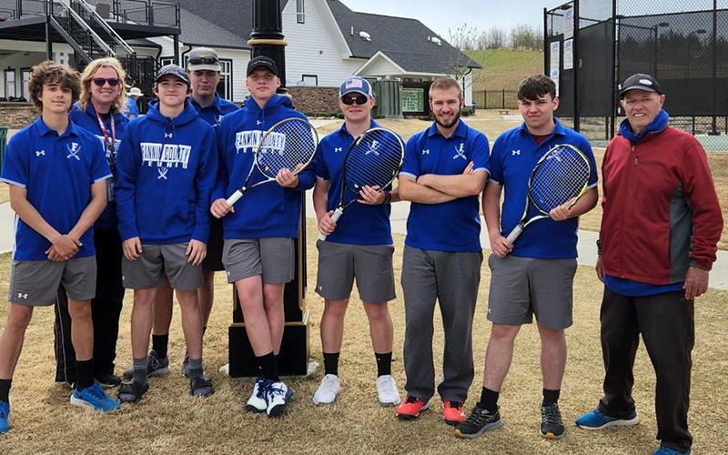 The Fannin County High School men’s tennis team smile after securing the third place seed for the AA State Tournament Wednesday, March 30. Shown are, from left, Max Roberson, Coach Suzianne Pass, Will Jones, Rob Russell, Gavin Mowery, Hunter Satterfield, Sam Jabaley, Luke Pelfrey and Assistant Coach Mark Miller.
