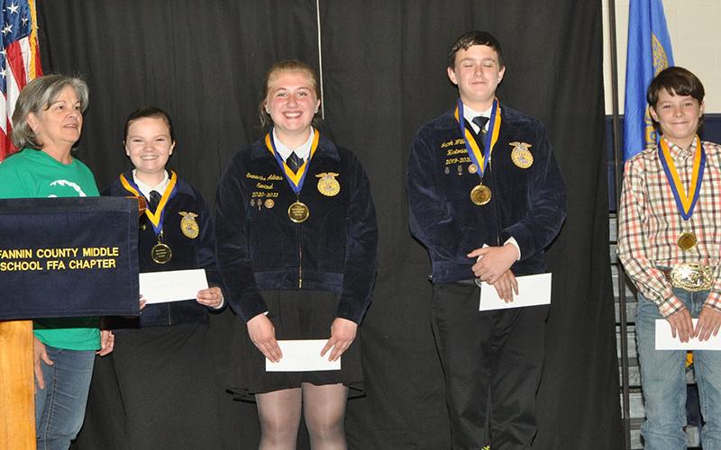 Laurie McClearen, left, is shown with recipients of awards presented at the FFA Middle School chapter banquet, from her left, Sarah Brawley, Samantha Adkins, Jacob Williams and Mason Ramey.