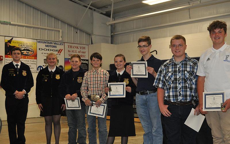 Award winners at the Fannin County Middle School FFA banquet included, from left, Jacob Williams, Samantha Adkins, Dakoda Moore, Mason Ramey, Sarah Brawley, James Burrell, Drew McDaris and Marcus Turner.
