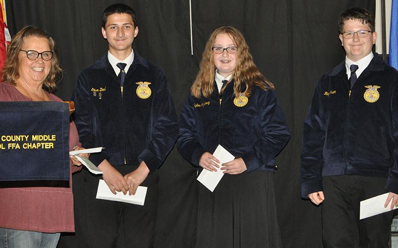 FFA Advisor Rhonda Matthews presented awards to, from left, Ethan Deal, Skylar Gazaway and Roy Green.