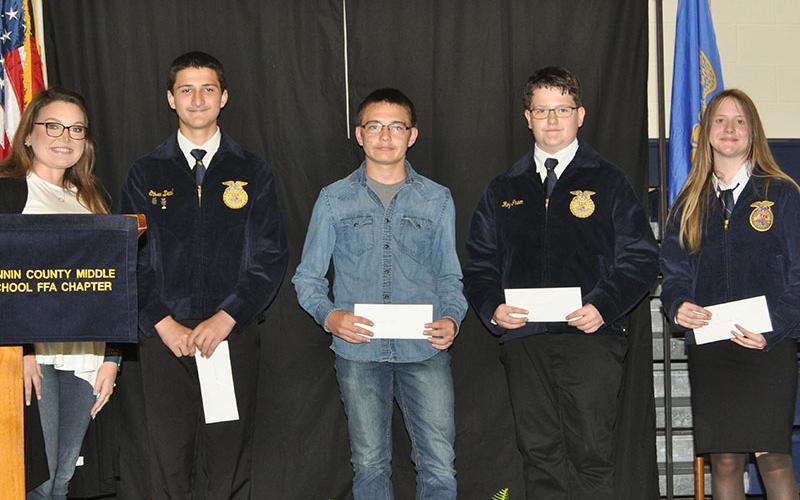 Fannin Middle School FFA members received awards from advisor Emily Fellenbaum. Shown, from left, are Fellenbaum, Ethan Deal, Ben  Queen, Roy Green and Hannah Cochran.