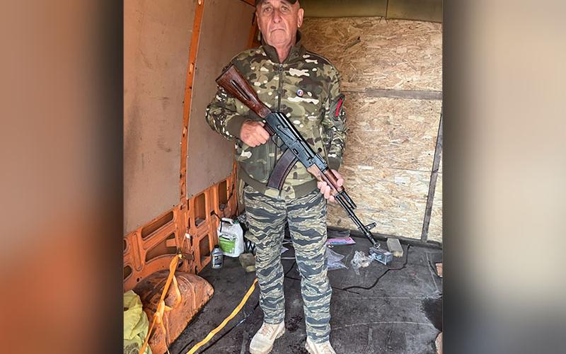Bob Renneke is shown standing in the back of the van he, Andrew and Macjic used to transport Ukrainian refugees. As many as 17 refugees crammed into the van for their trip to the Polish border and freedom.