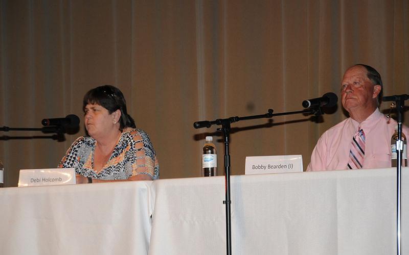 Fannin County Board of Education candidates, Debi Holcomb, left, and incumbent Bobby Bearden address the audience at the Chamber of Commerce Political Forum.