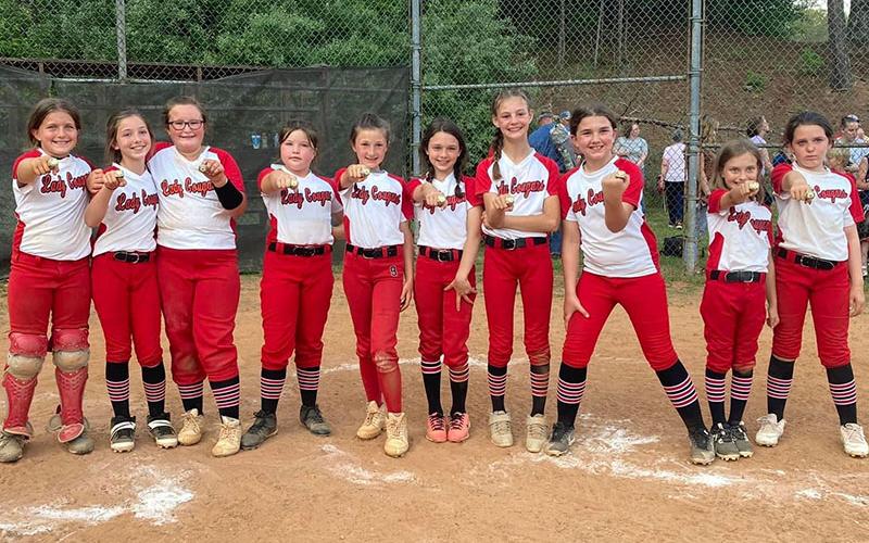 The Copper Basin 10Under girls finished their regular season in second place before taking first place in the Mountain Dizzy Dean Championship. The team included, from left, Madden Beach, Maleah Deal, Kinsley Ross, Kourtney Kraft, Kallie Mosley, Malaney Scoggins, Ayla Waters, Emma Sue Hughes, Kyleigh Boring, and Paisley Williams. The team’s coaches were Amanda Hyatt, Rodney Ross and Daniel Deal.
