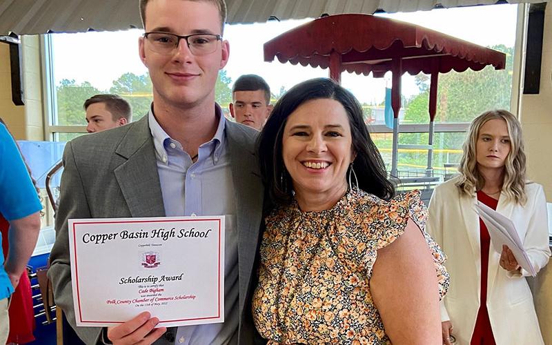 Polk County Chamber of Commerce Diplomat Jenny Mundy is shown with Copper Basin Graduate Cade Bigham after he received the Polk County Chamber of Commerce Scholarship.