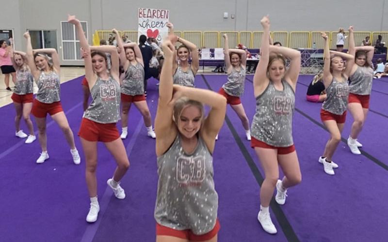 Members of the Copper Basin High School Cheer Squad work on one of their routines during the Universal Cheerleaders Association Cheer Camp at Tennessee Tech University.