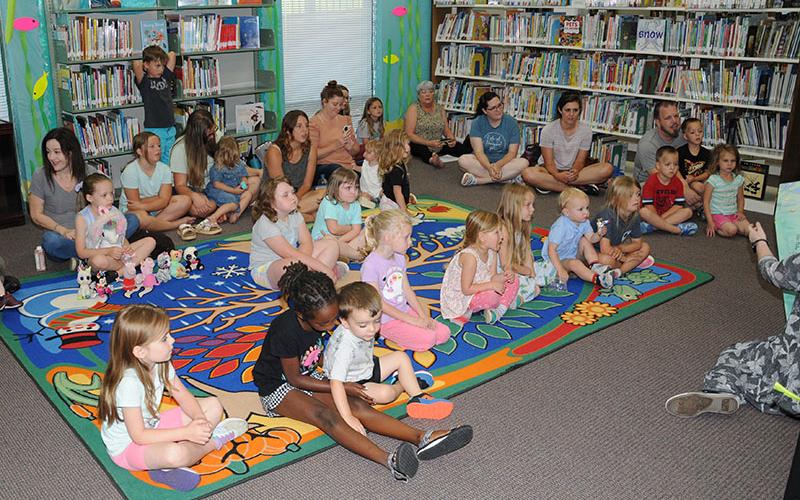 A summer filled with programs was kicked off with “Oceans of Possibilities Storytime” Wednesday, June 1, at the Fannin County Public Library in Blue Ridge. Children and parents listened to Hannah Loudermilk get the program started.