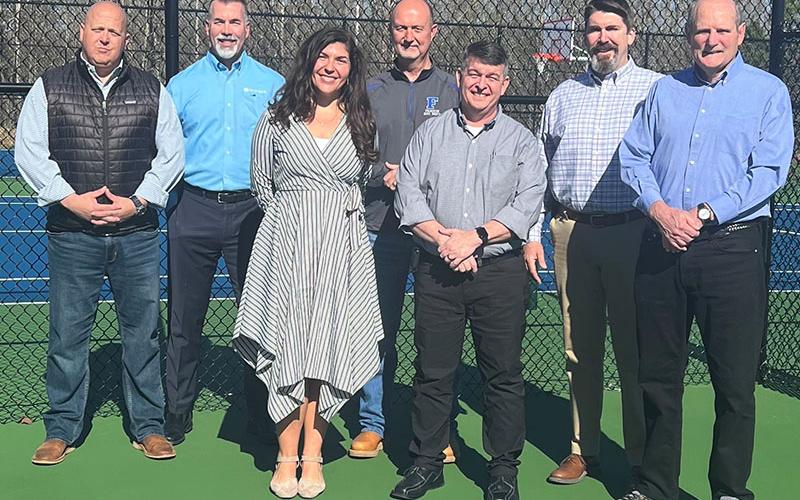 County officials, chamber of commerce members, and members of the Tourism Product Development (TPD) fund committee gathered in early April to celebrate the opening of the new tennis and pickle ball courts at the county recreation center off Tom Boyd Road. Shown opening the courts are, from left, Brandon Holloway, Richard York, Christie Gribble, Eddie O’Neal, Jamie Hensley, Jason Jones and Glenn Patterson The TPD funds are generated from the county’s hotel/motel tax.