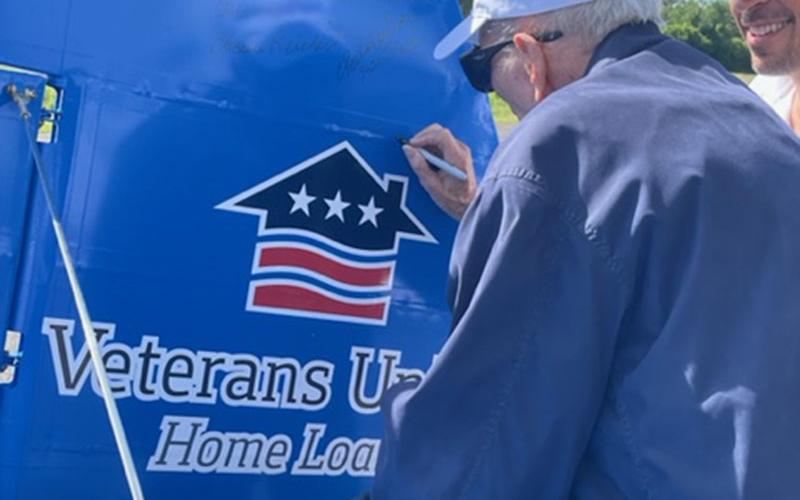 A Blue Ridge Assisted Living and Memory Care resident and WWII veteran Hoyt Campbell signed the tail of the Dream Flight plane Friday, June 10. This tail piece will be featured in a Freedom Flight museum.