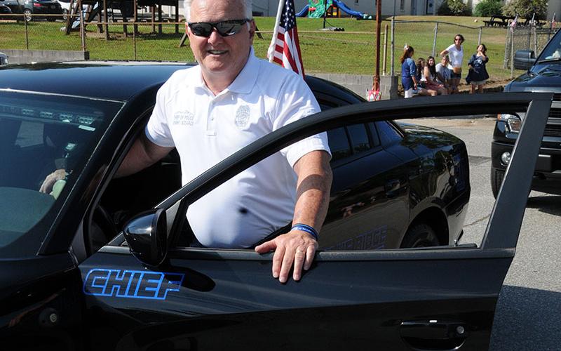 Blue Ridge Police Chief Johnny Scearce led the Old Timers Parade Saturday, July 4, through Blue Ridge. He has been at the front of such events for over 30 years.