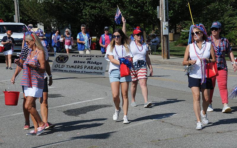 Various groups passed out treats to the children who lined the route for the Old Timers Parade July 4 through downtown Blue Ridge.