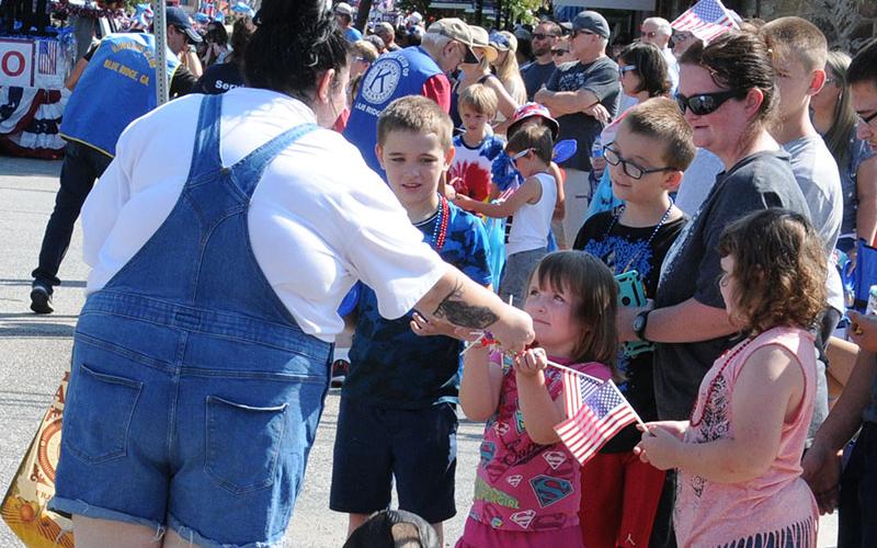 Children along the parade route in downtown Blue Ridge were treated to candy and other treats by several of the parade participants.